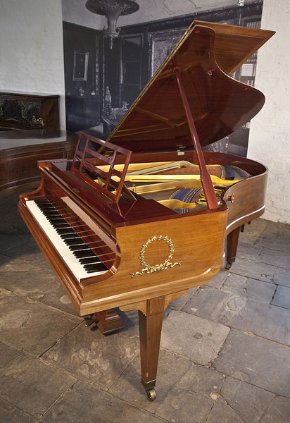A 1914, Bluthner Grand Piano For Sale with a Walnut Case and Open Work Music Desk. Cabinet Features Ormolu Decoration of Laurel Wreaths on Piano Cheeks