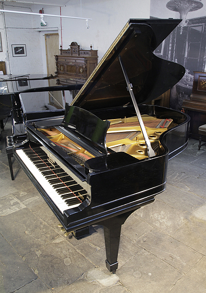 A 1900, Steinway Model A grand piano for sale with a black case and spade legs