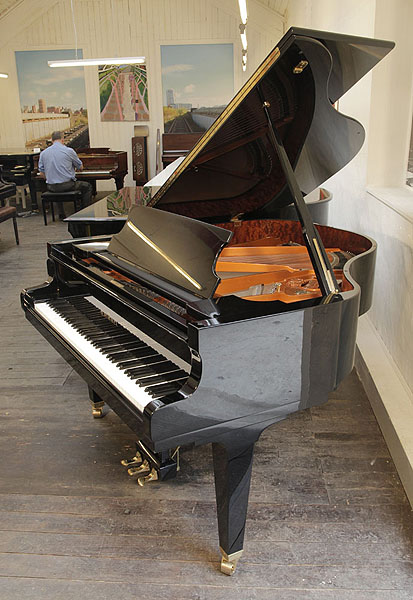 A 2002, Schimmel GP169 Konzert grand piano with a black case and brass fittings