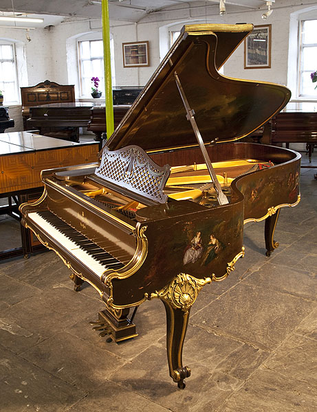 A 1904, Rococo Style, Steinway Model B grand piano for sale with an ornately carved, case with gilt accents and scroll foot cabriole legs. Entire cabinet features exquisite hand-painted scenes in fete galante style. Piano has an eighty-eight note keyboard and a three-pedal lyre. 