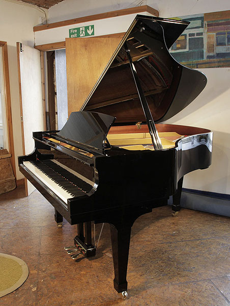 A 2000,  Boston GP178 PE grand piano grand piano for sale with a black case and spade legs.