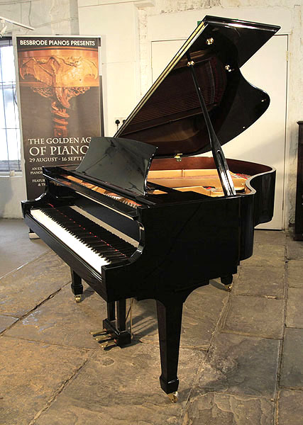 A 2007, Essex EGP155 baby grand piano with a black case and polyester finish.
Designed by Steinway and Sons.