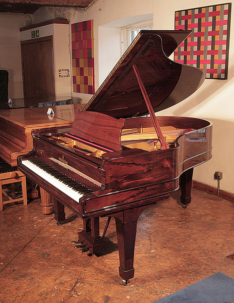 Restored, 1878, Steinway Model A grand piano for sale with an exquisite, rosewood case and spade legs. Piano has an eighty-five note keyboard and a three-pedal lyre. 