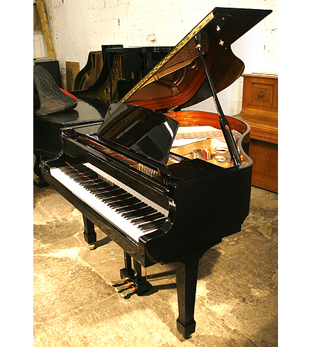 Brand new Steinhoven Model 148 baby grand piano with a black case and polyester finish. Piano has an eighty-eight note keyboard and a three-pedal piano lyre.