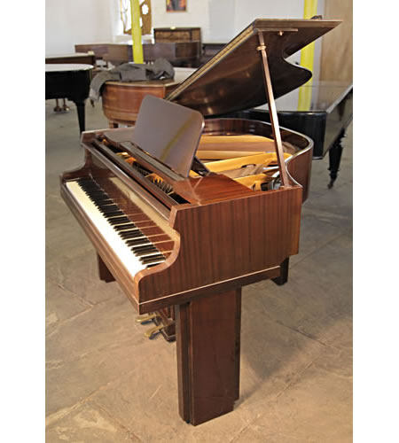 A 1939, Art Deco Allison baby grand piano with a polished mahogany case. Legs and lyre feature strong geometric styling