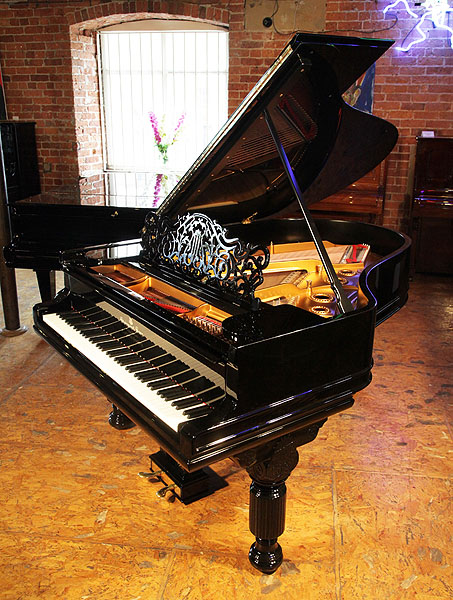 A rebuilt, 1887, Steinway Model A Grand piano for sale with a black case, filigree music desk and fluted, barrel legs
