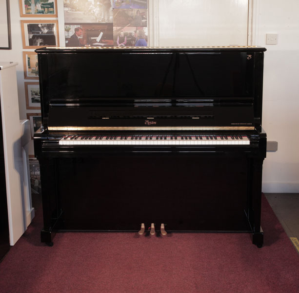 Reconditioned, 2010, Boston UP-132 Upright Piano For Sale with a Black Case and Brass Fittings. Piano has an eighty-eight note keyboard and three pedals