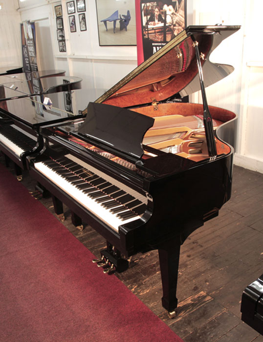 Edelweiss G66 grand piano for sale with a black case and fitted iQ Pianodisc player system. Piano has a three-pedal lyre and an eighty-eight note keyboard. 