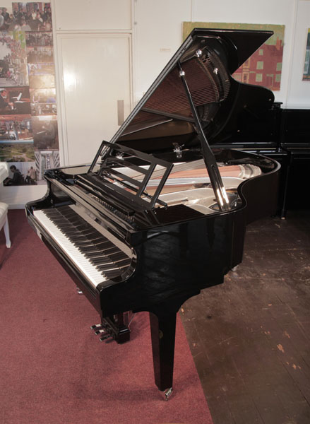 Pre-owned, 2021, Feurich Model 179 Dynamic II grand piano with a black case, chrome fittings and square tapered legs. Piano has an eighty-eight note keyboard and a three-pedal piano lyre.  