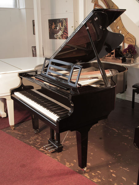 Pre-owned, 2018, Feurich Model 179 Dynamic II grand piano with a black case, chrome fittings and square tapered legs. Piano has an eighty-eight note keyboard and a three-pedal piano lyre.  