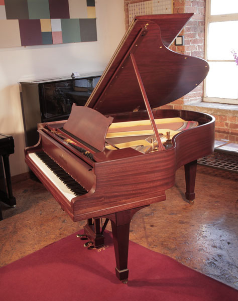 Rebuilt, 1929,  Steinway Model M Grand piano for sale with a satin,  mahogany case and matching stool. Piano has an eighty-eight note keyboard and a two-pedal lyre 