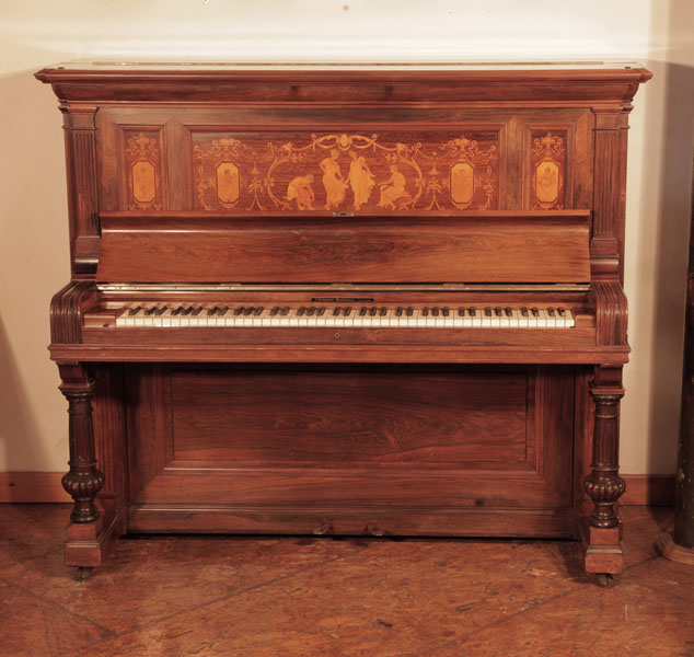 Reconditioned, 1894, Steinway  upright piano for sale with a polished, rosewood case and panels  inlaid  in with dancing ladies and putti. Piano has an eighty-five note keyboard and two pedals 