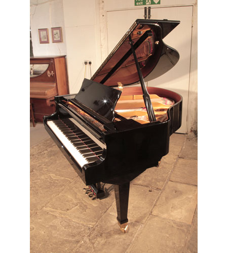  Reconditioned, 1988,  Weber WLG-50 baby grand piano with a black case and spade legs. Piano has an eighty-eight note keyboard and a three-pedal lyre.