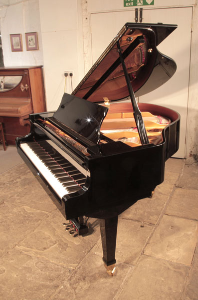 Reconditioned, 1988,  Weber WLG-50 baby grand piano for sale with a black case and spade legs. Piano has an eighty-eight note keyboard and a three-pedal lyre.  