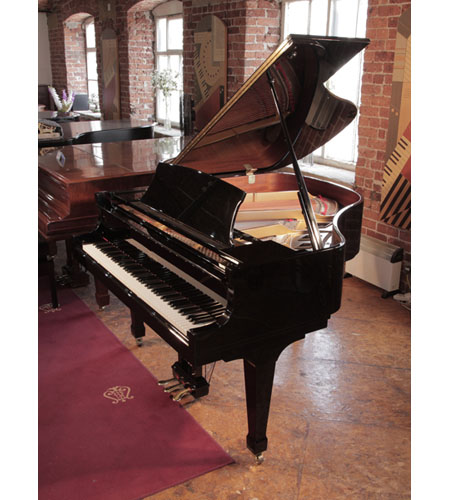 RA 2000, Boston GP156 II baby grand piano with a black case and spade legs. Designed by Steinway. Piano has an eighty-eight note keyboard and a three-pedal lyre. 
