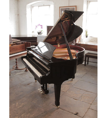  Carl Steinberg baby  grand piano for sale in black gloss. Piano has an eighty-eight note keyboard and a three-pedal lyre.