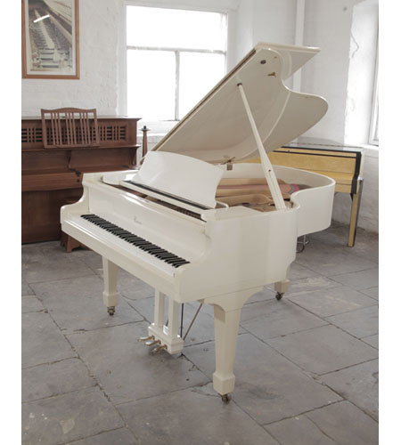Reconditioned, Cranes SG-172 grand piano in ivory gloss with brass fittings. Piano has an eighty-eight note keyboard and a three-pedal lyre. 