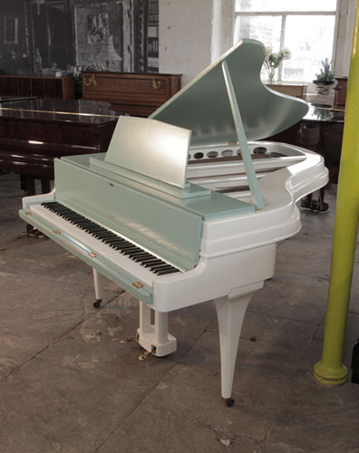 Reconditioned 1953, Rippen grand piano with a contrasting satin teal and white aluminium case. Piano has an eighty-eight note keyboard and two-pedal lyre.