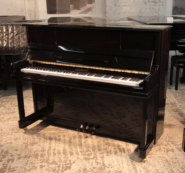 Reconditioned, Steinhoven1972, Kawai  BL-61  upright piano for sale with a black gloss case. Piano has an eighty-eight note keyboard and three pedals.  