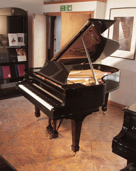 A 1916, Steinway Model A grand piano for sale with a black case and spade legs. 