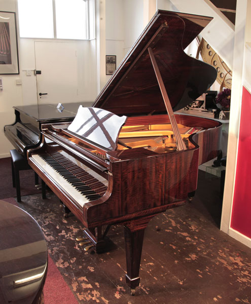 A 1975,  Steinway Model A grand piano for sale with a tiger mahogany case