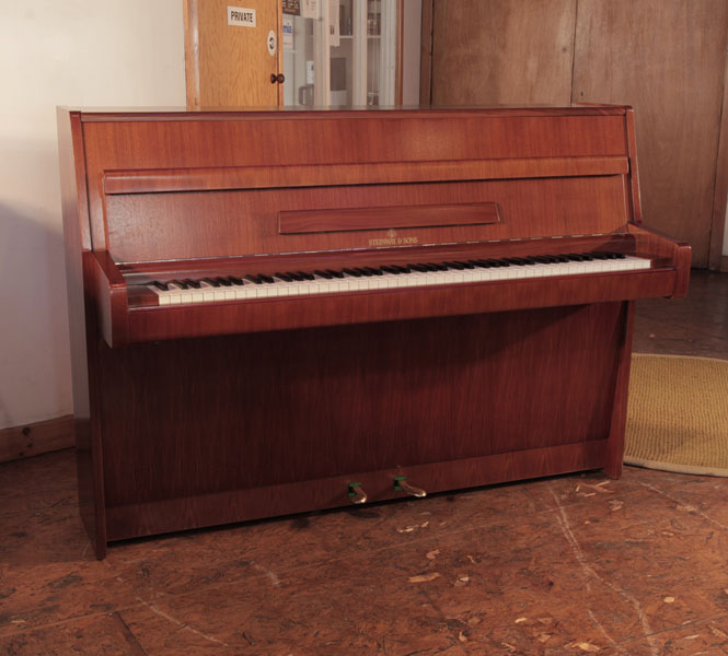 A 1968, Steinway Model F  upright piano for sale with a walnut case and brass fittings. Piano has an eighty-eight note keyboard and two pedals