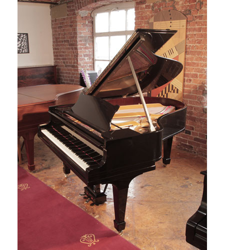 Rebuilt, 1925, Steinway Model O grand piano with a with a black case.. Piano has an eighty-eight note keyboard and a two-pedal lyre.