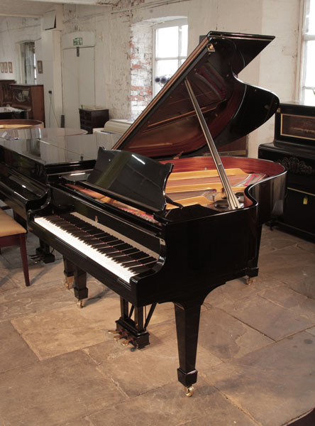 A 1986, Steinway Model O grand piano for sale with a black gloss case and spade legs. Piano has an eighty-eight note keyboard and a three-pedal lyre.