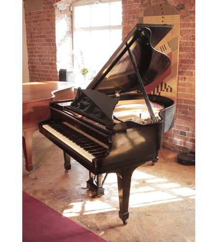 Reconditioned, 1925, Steinway Model S baby grand piano for sale with a black case and spade legs. Piano has an eighty-eight note keyboard and a two-pedal lyre. 