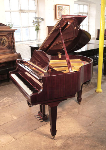 Reconditioned,  Weber G-150 baby grand piano for sale with a mahogany gloss case. Piano has an eighty-eight note keyboard and a three-pedal lyre. 