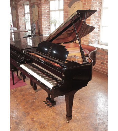 Art Deco style, 2002, Essex EGP160 baby grand piano in black gloss. Piano has an eighty-eight note keyboard and a three-pedal lyre. 
